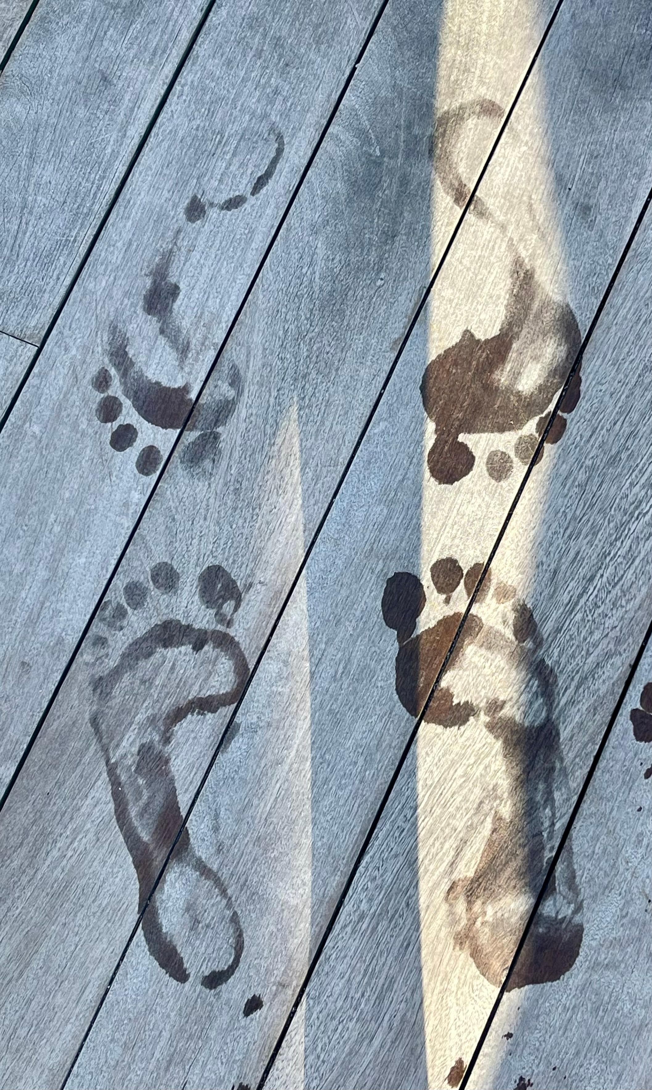 Our footprints by the adult infinity pool