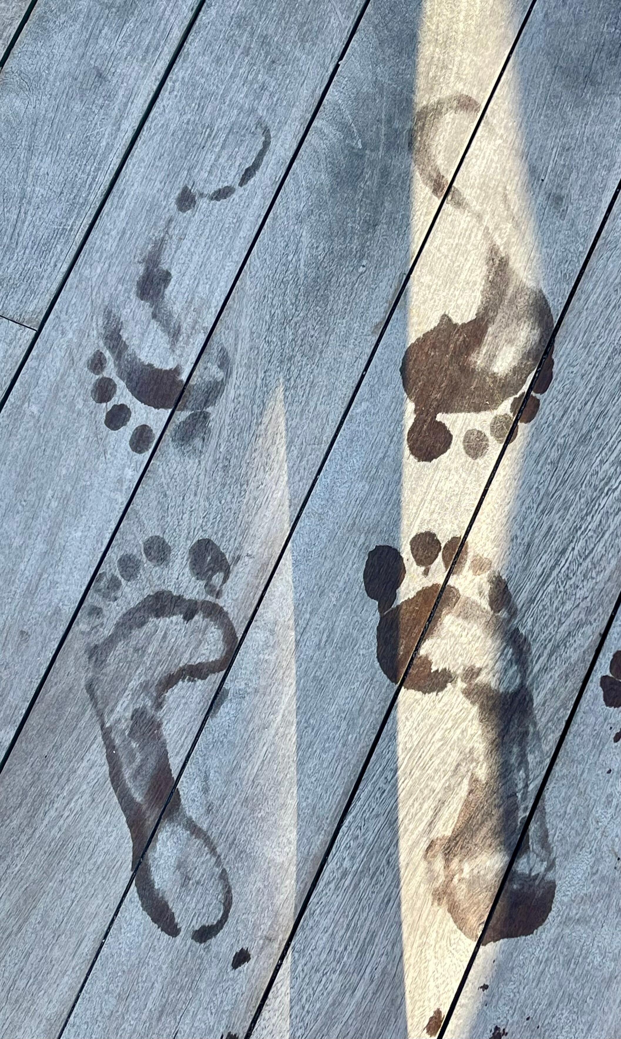 Our footprints by the adult infinity pool