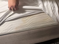 Stained and smelly mattress.