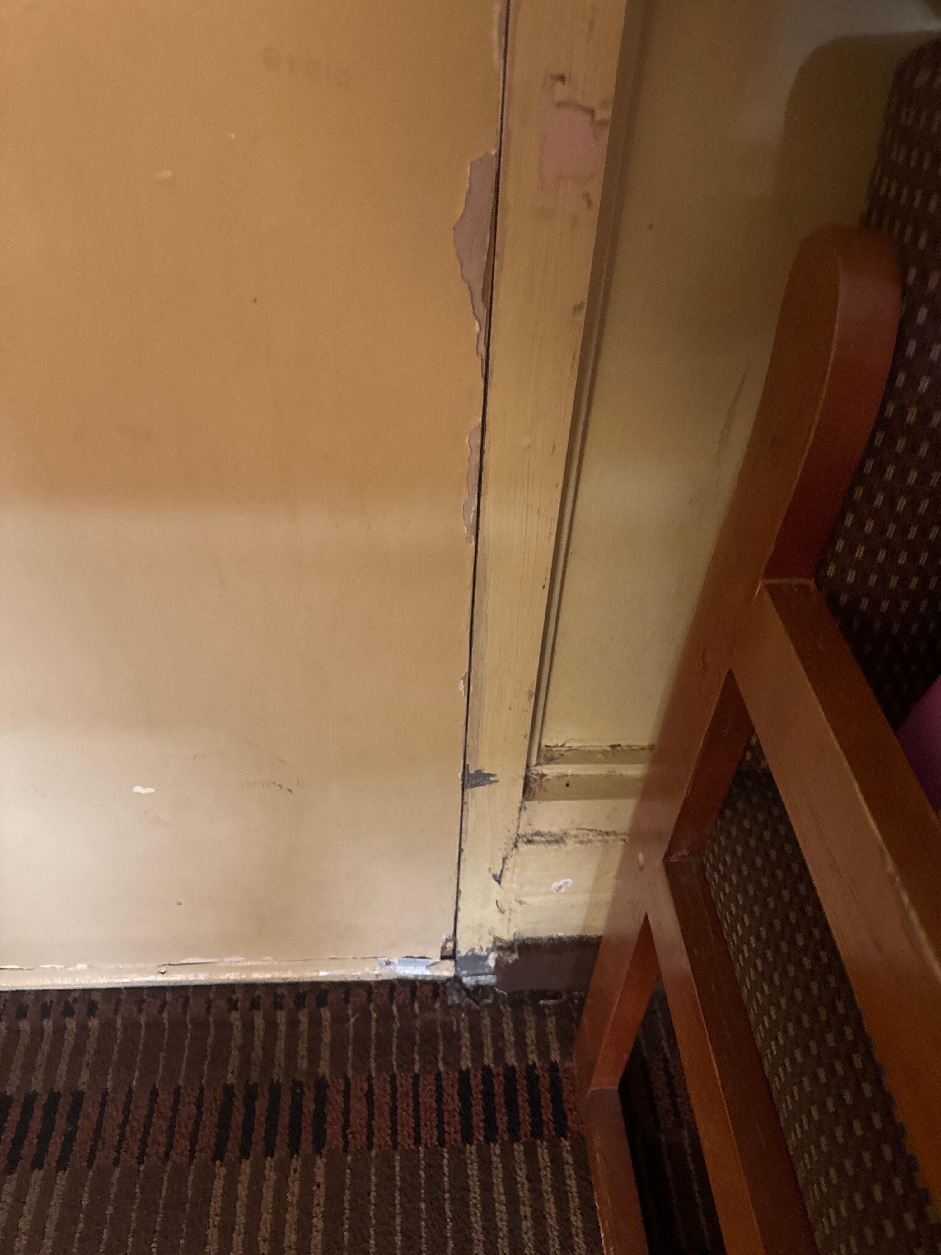 The door was bowing and the paint was severely chipped