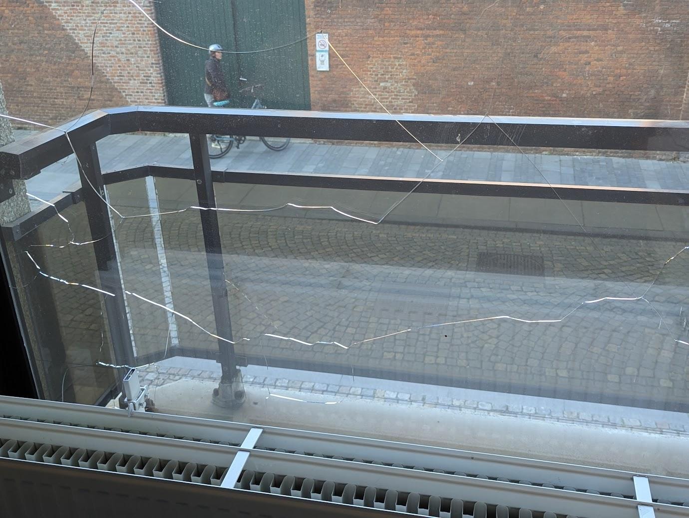 Window with large cracks