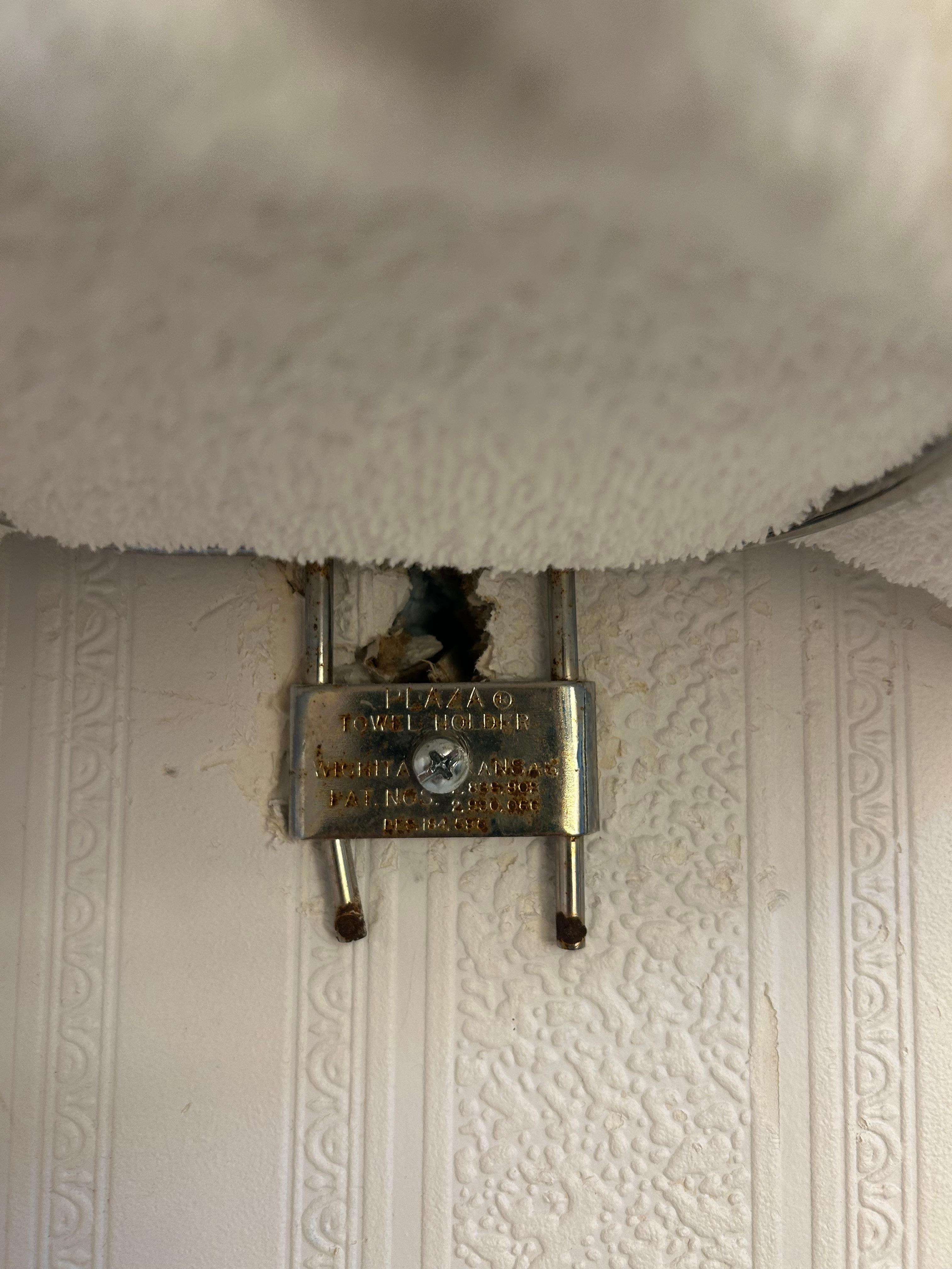 This was the bathroom with holes in it .