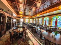 Breakfast area, as well as evening dining/bar. The sun shining through the stain glass windows always makes me happy.