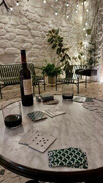 Cards and wine in the lovely courtyard