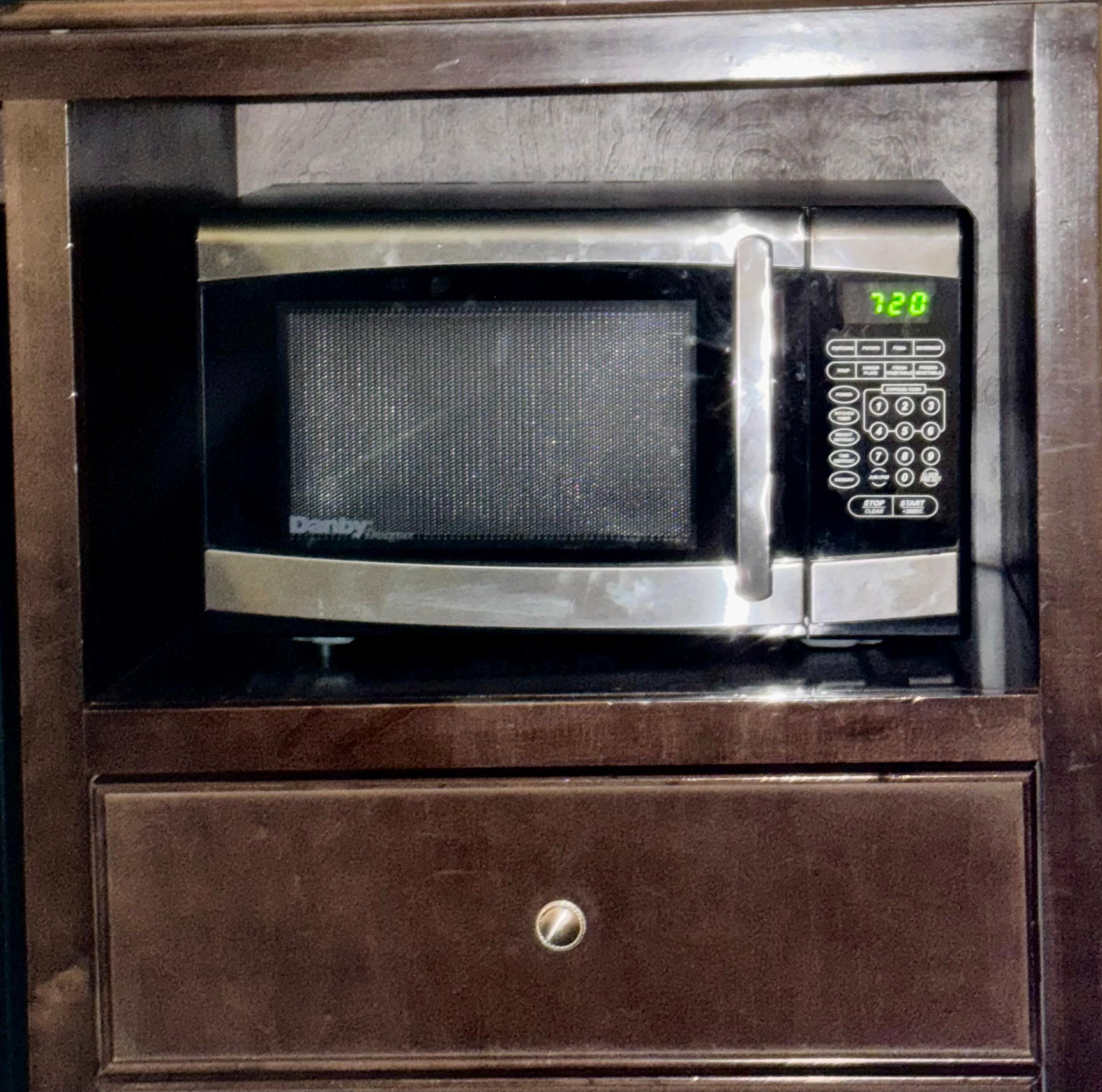 The right side of the microwave in the front was tilted. It was missing a piece so when we put food in there, it was tilt out of the container