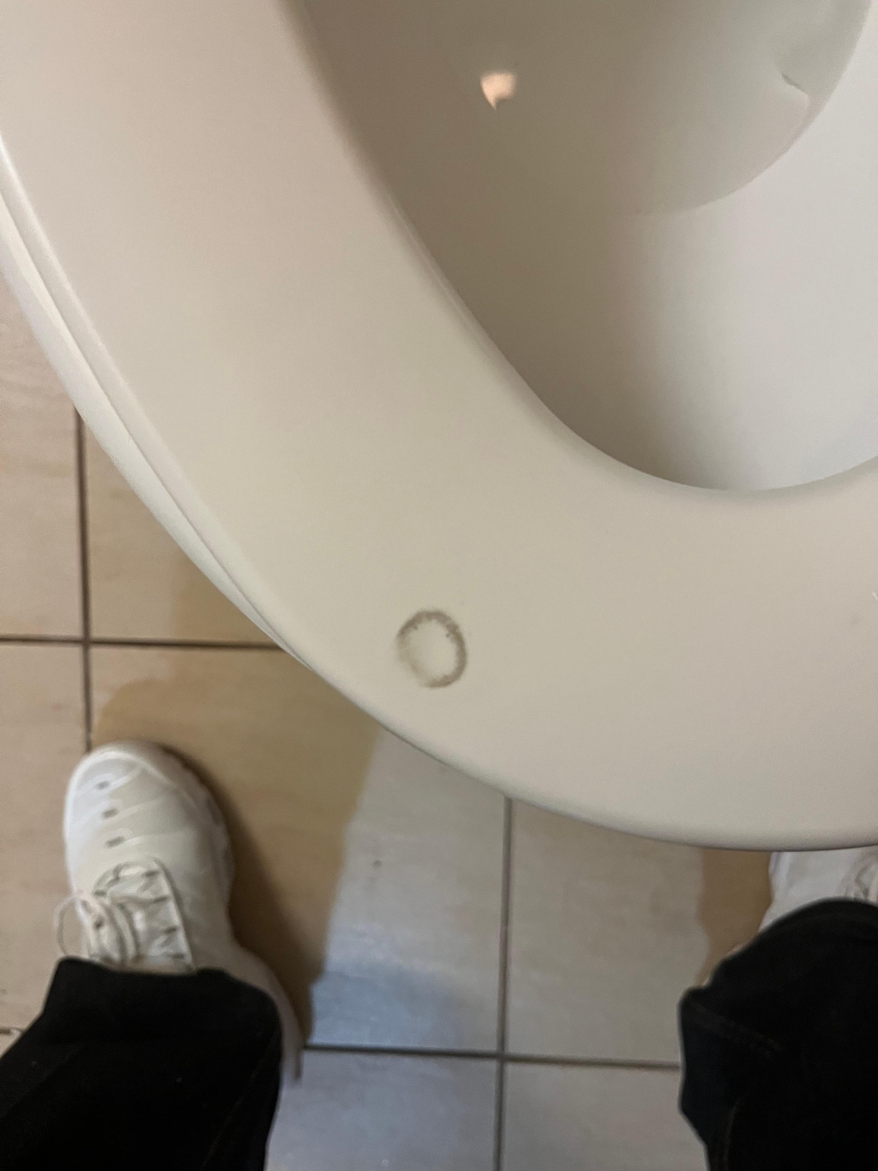 Toilet seat had cigarette burns 