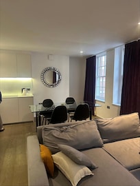 Dining room/mirror/couch don’t match listing