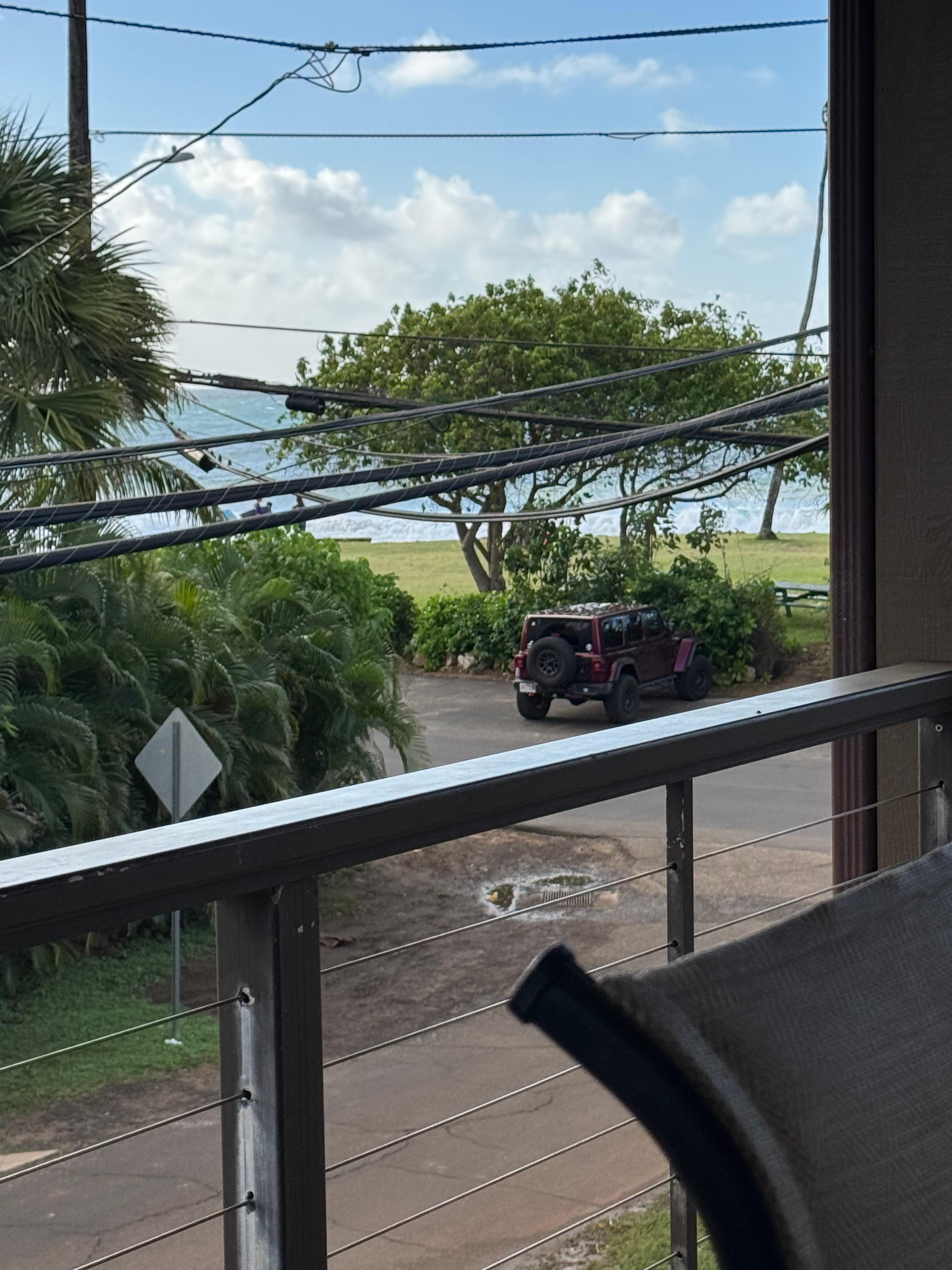 view from balcony with beach and ocean