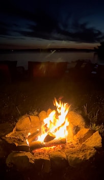 Late night campfire by the water.