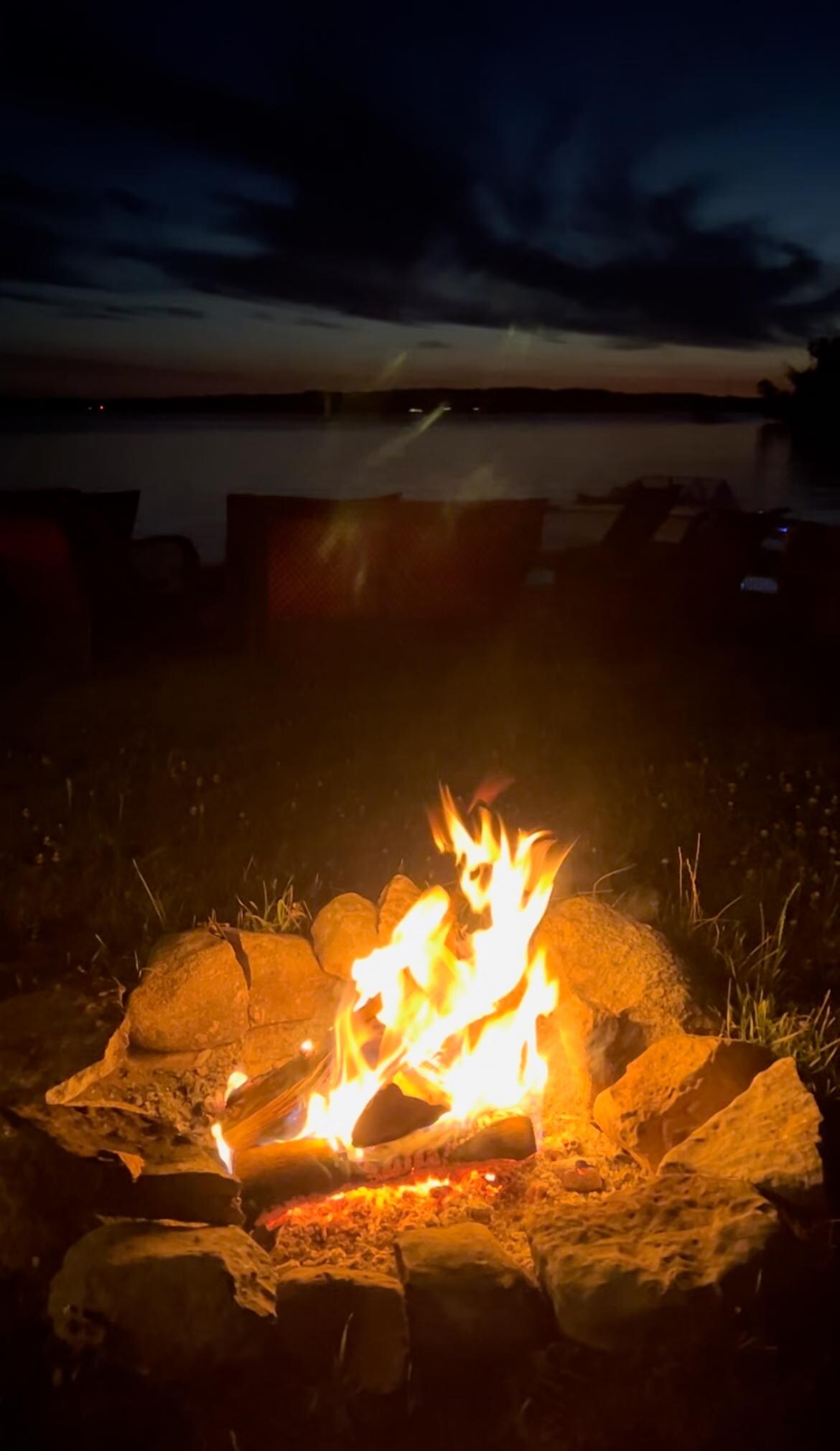 Late night campfire by the water.