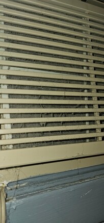 The dust on the air conditioner, not good for people with allergies