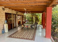 Outdoor dining area and main kitchen
