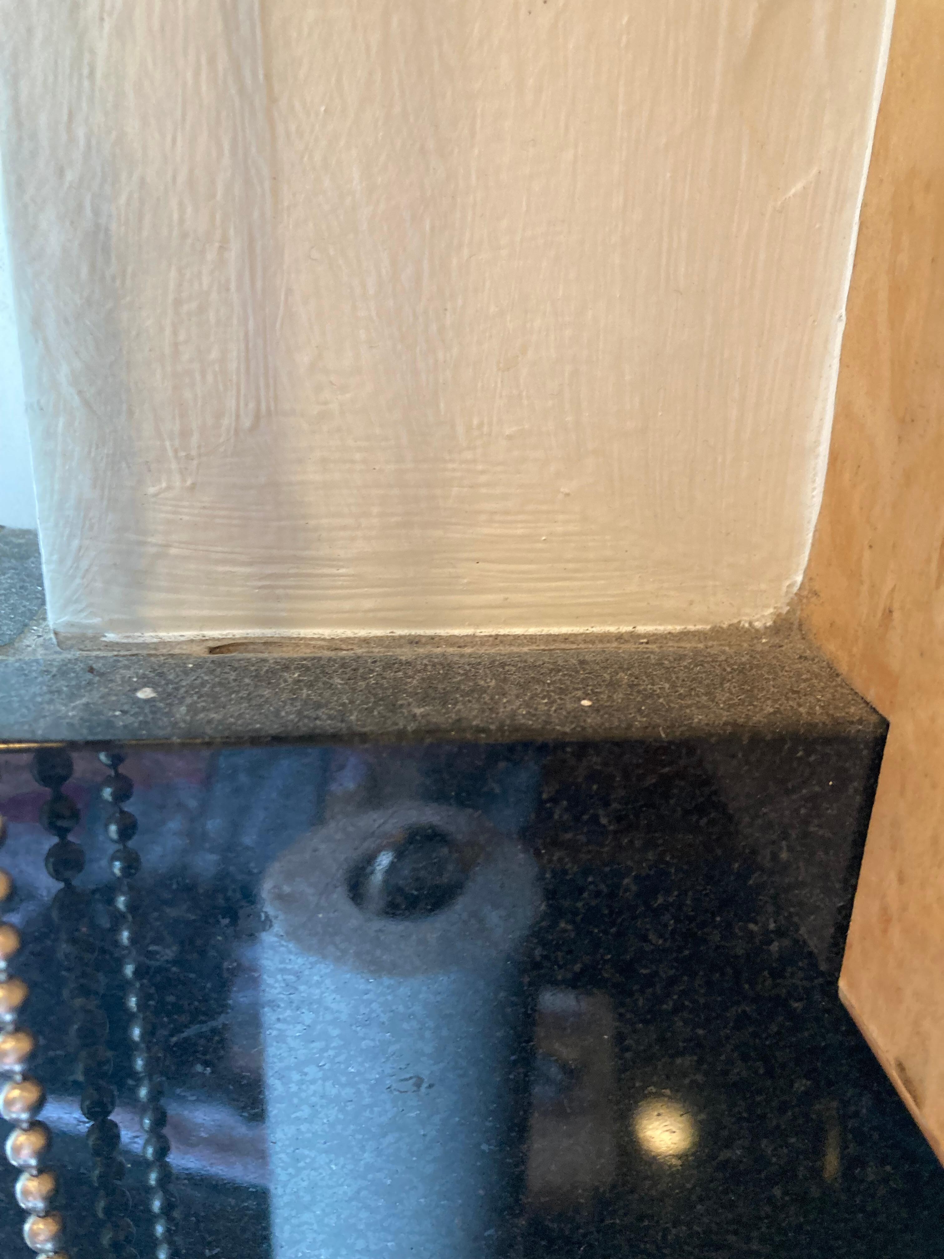 Filth on kit backsplash. Not pictured broken kit cab door just hangs. 