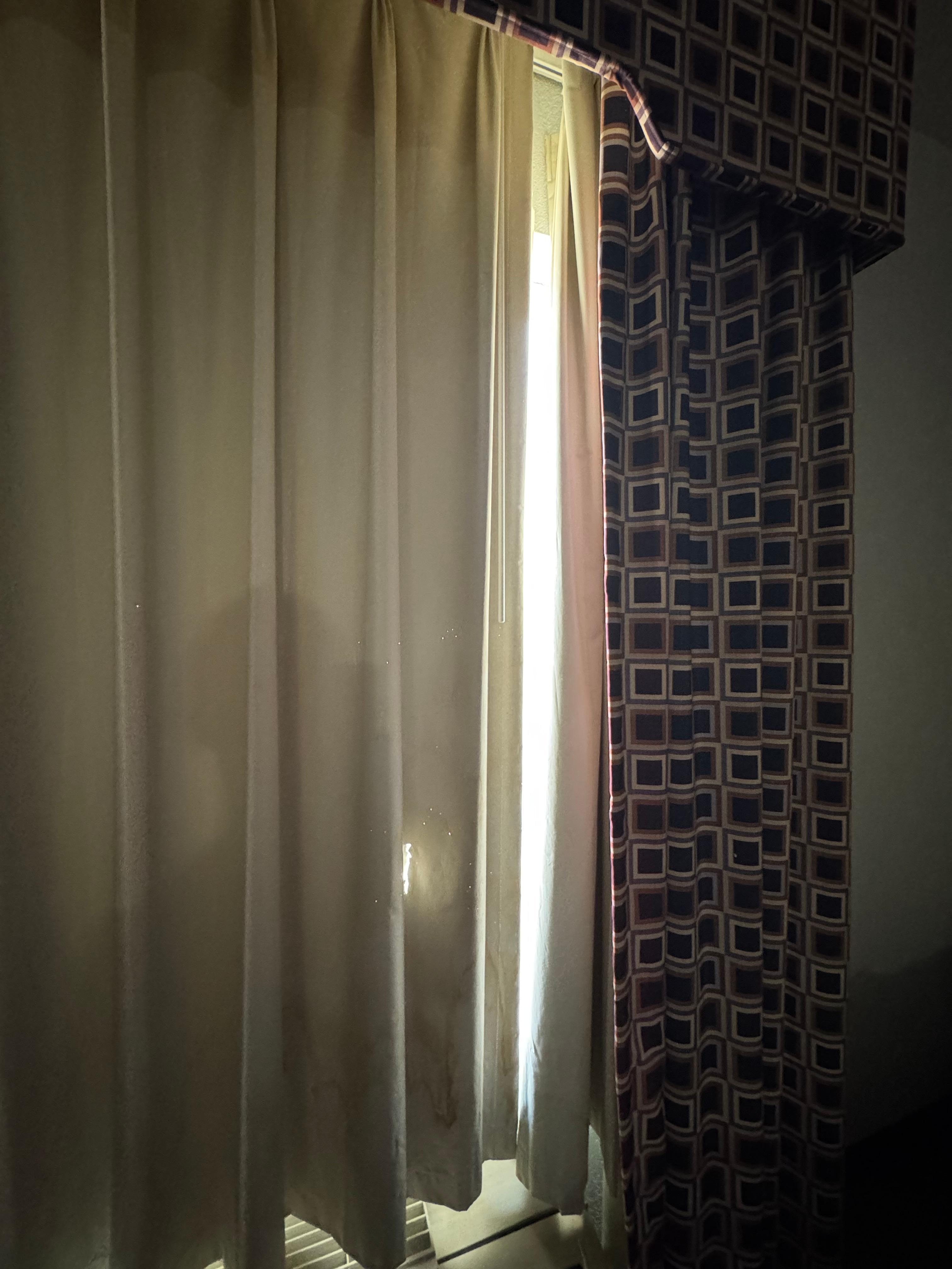 Opening when curtains are fully closed. 