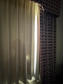 Opening when curtains are fully closed.