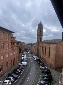 View from our room. A great little grocery store down the street that sells wine.