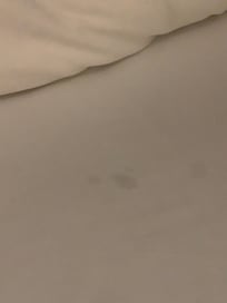 Bed linen with stain