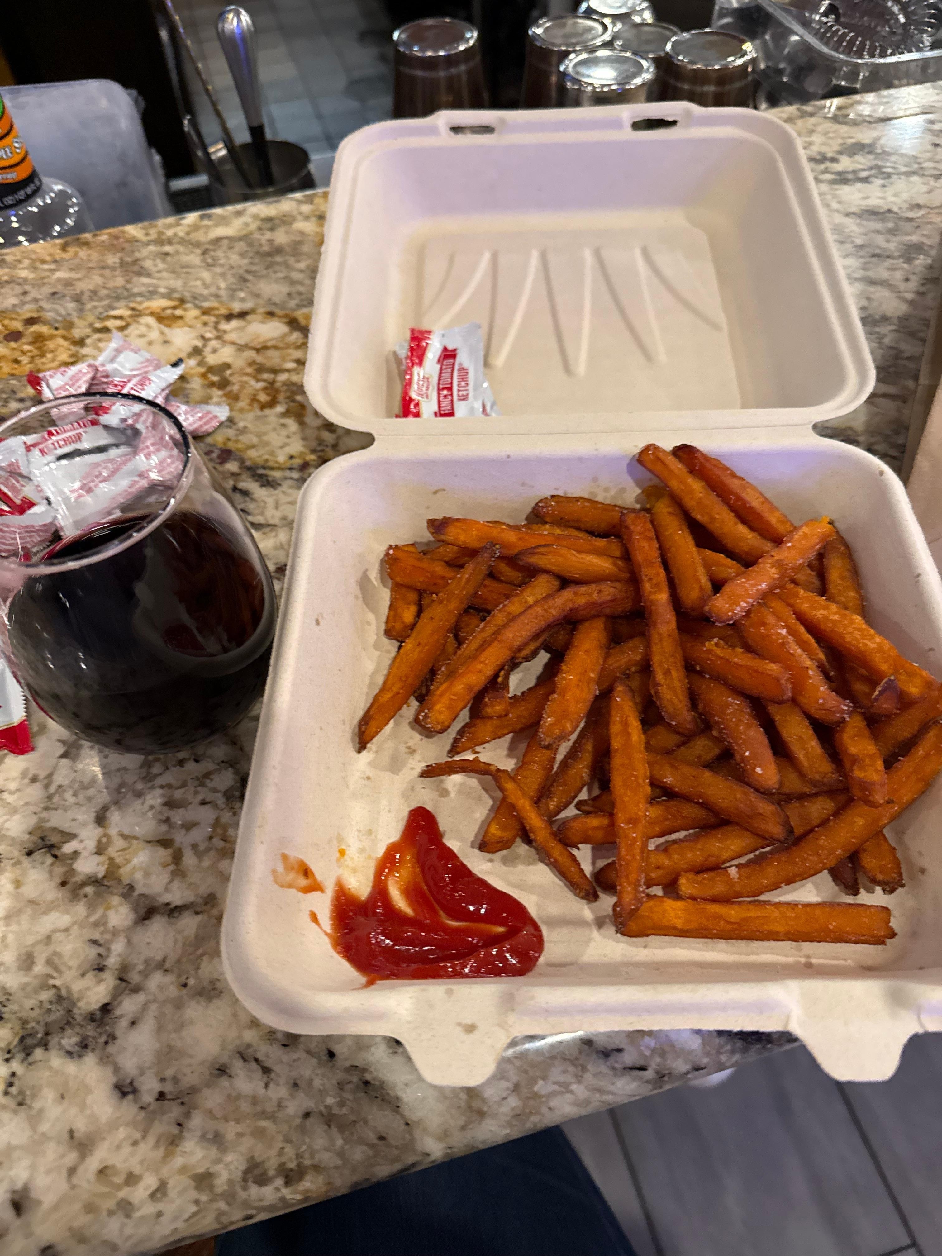 The sweet potato fries and Merlot where perfect for just getting off the plane. 