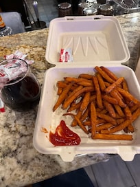 The sweet potato fries and Merlot where perfect for just getting off the plane.