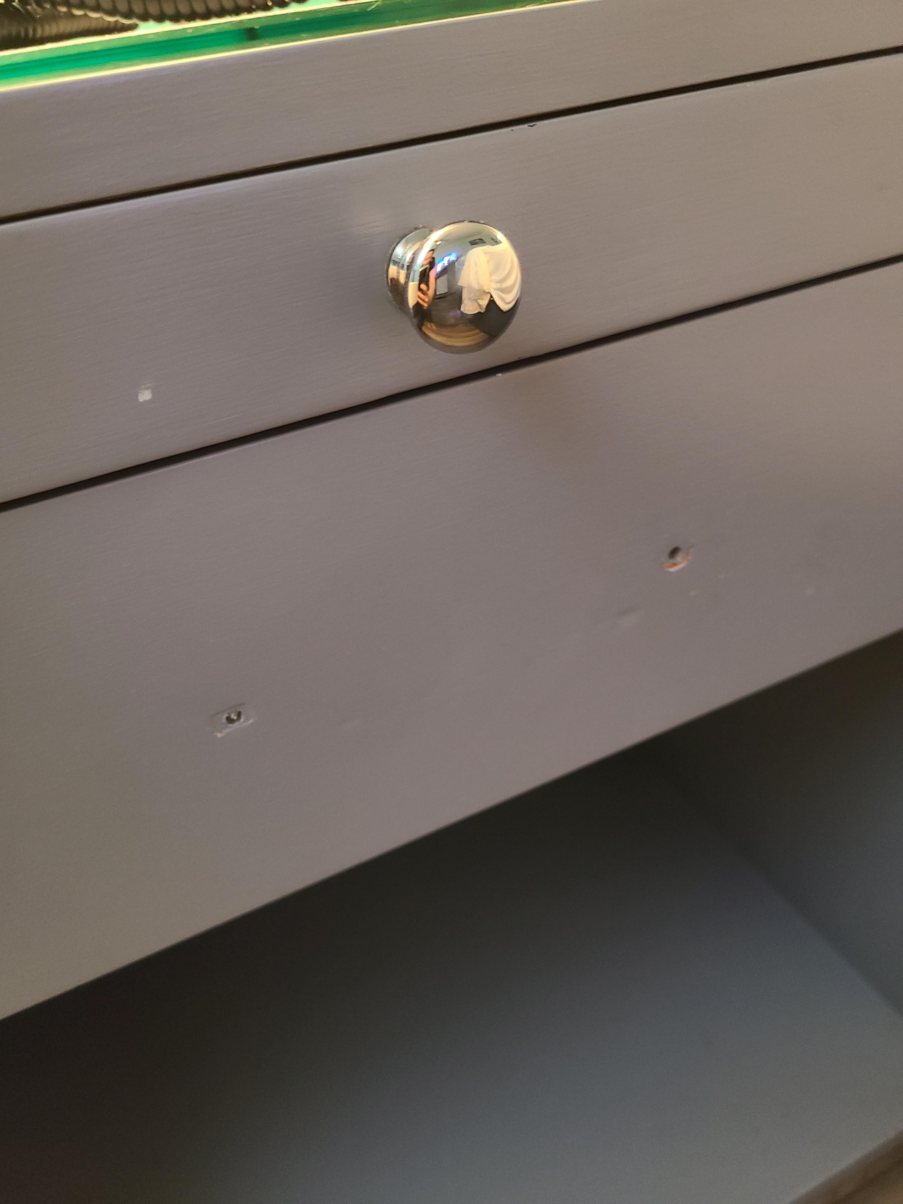 No handles on filthy sticky dresser drawer 