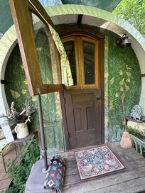 Hand painted caravan, Dutch door, floral and lace curtains