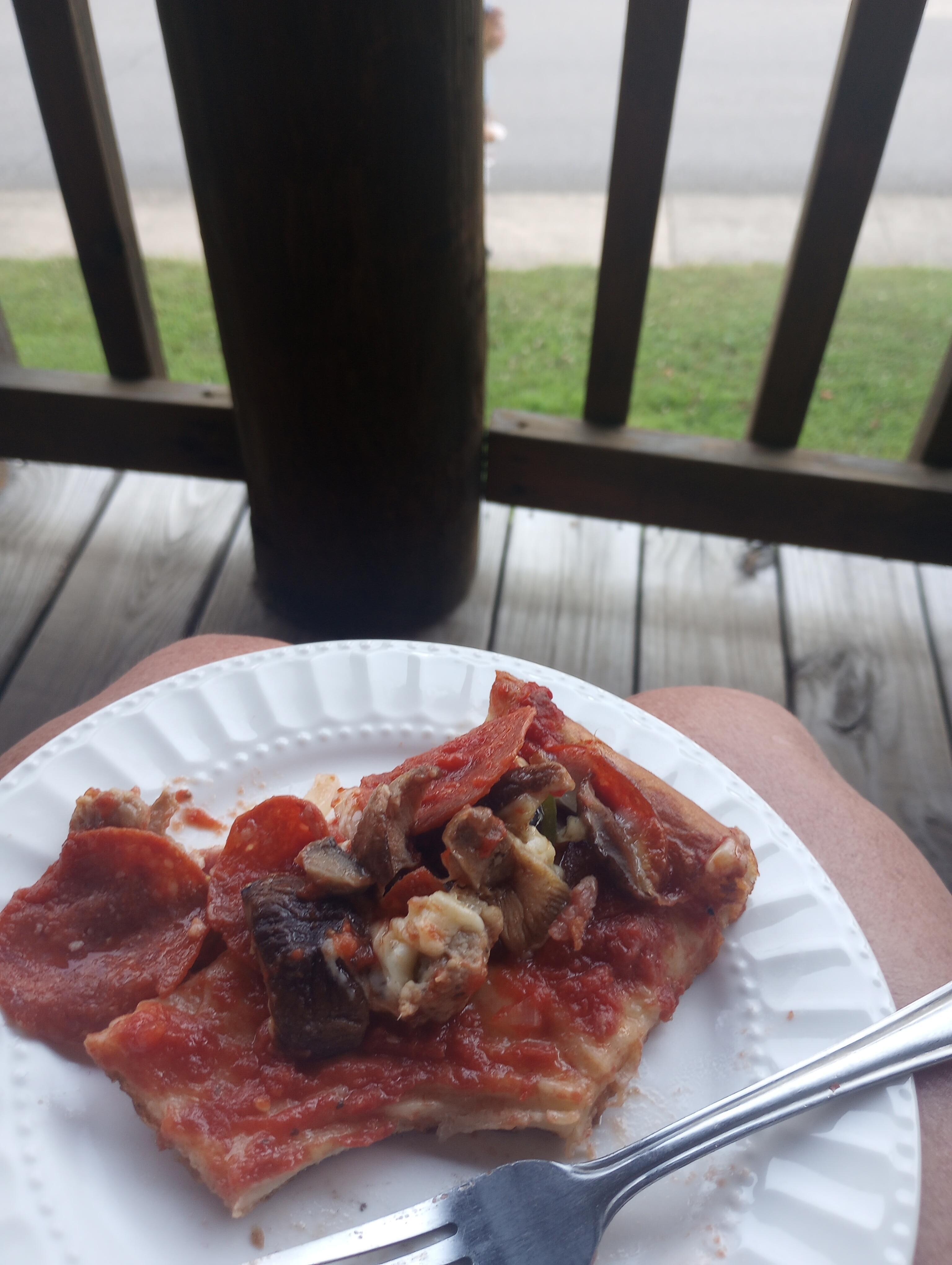 Enjoying Tommy's Famous in the porch.