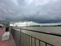 River front storm. Be ready. ( umbrella in unit to borrow