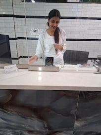 Lady at the front desk at nights