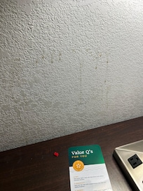 Brown splashes on wall