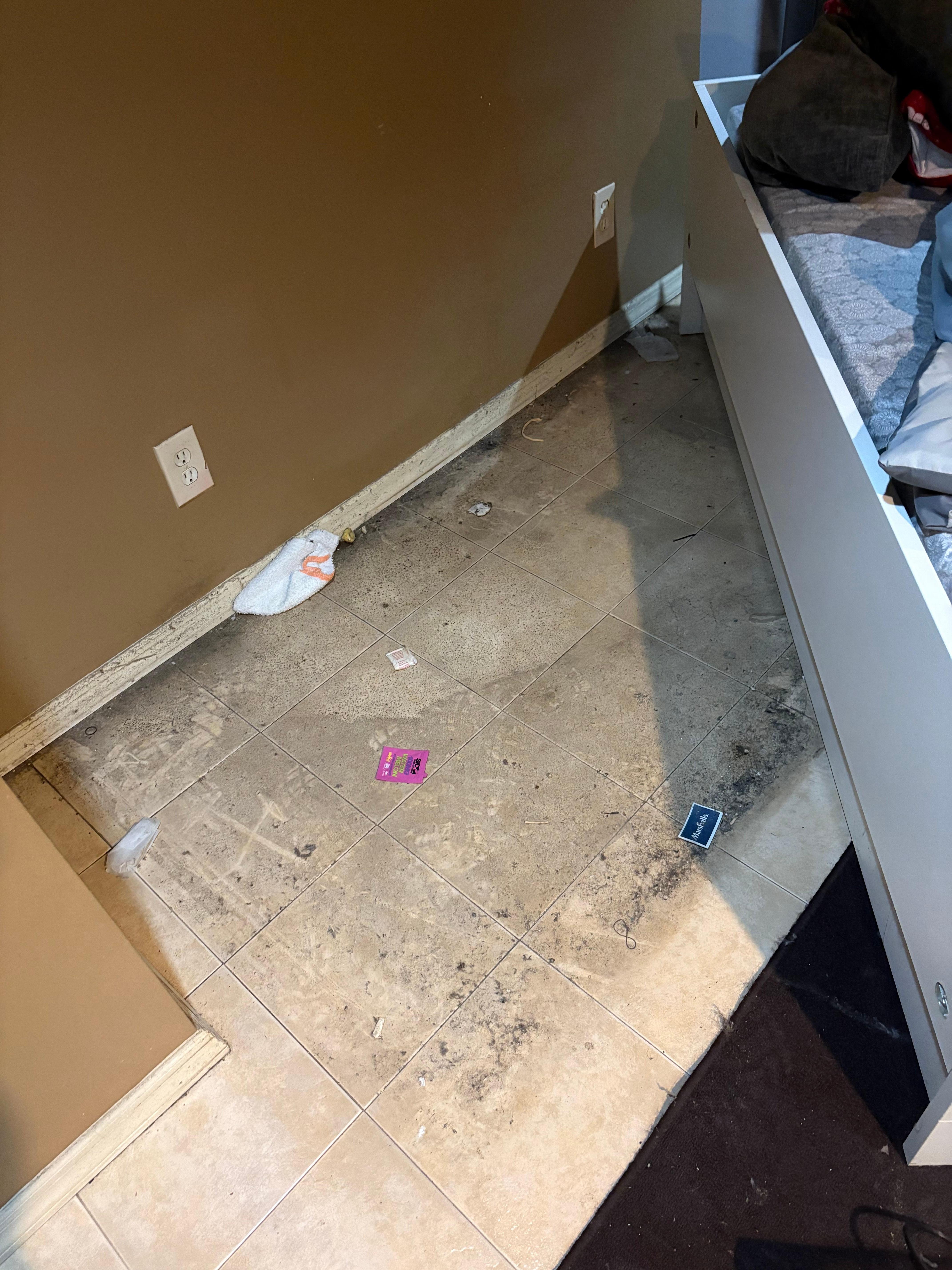 Dirty floor in unit.