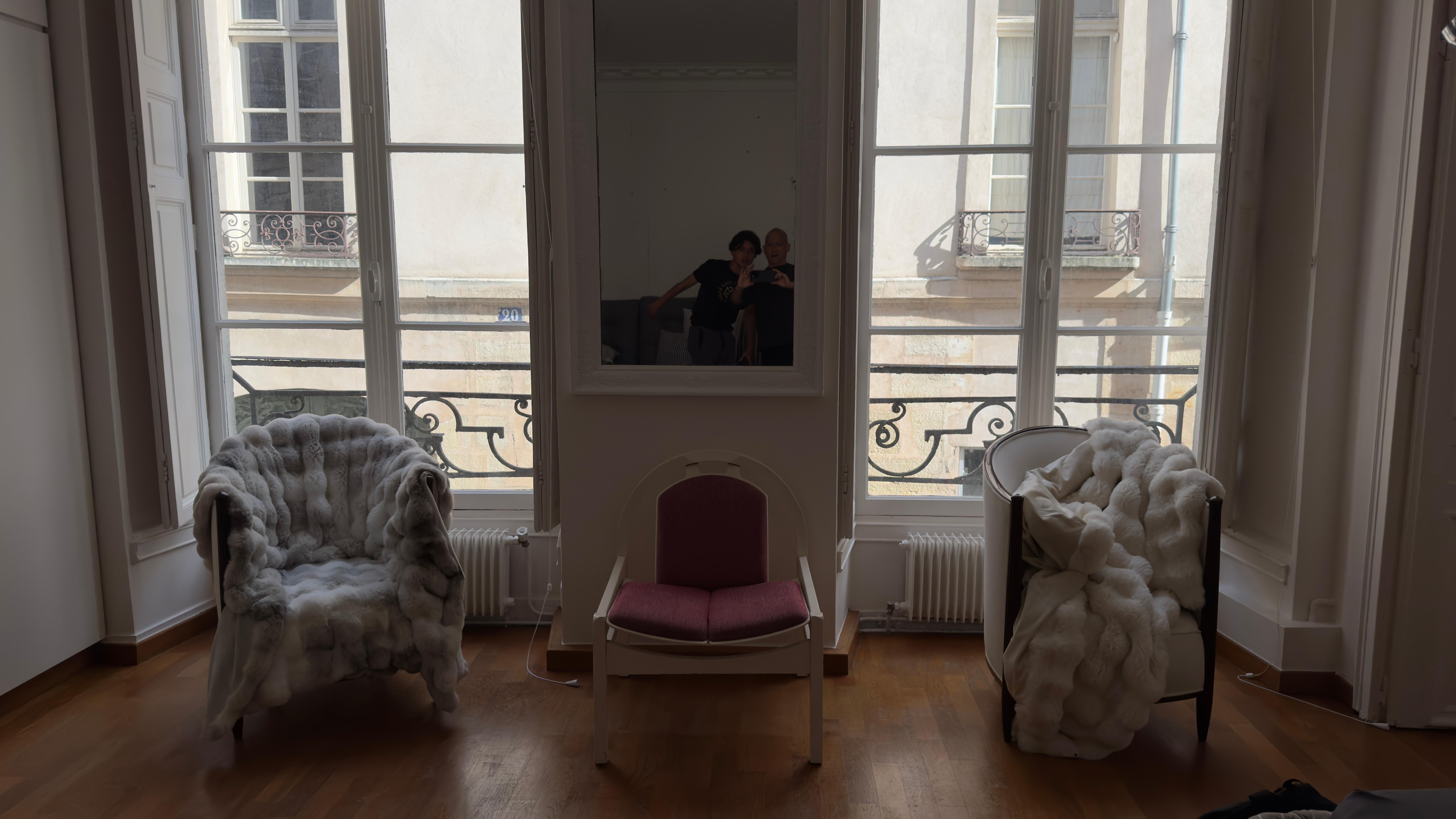 Living room with view of Rue Ferdinand Duval