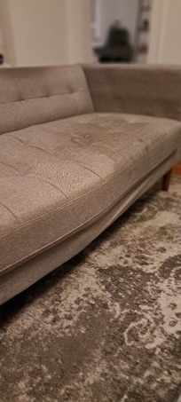 Sofa broken, sagging with huge stain on half of seat