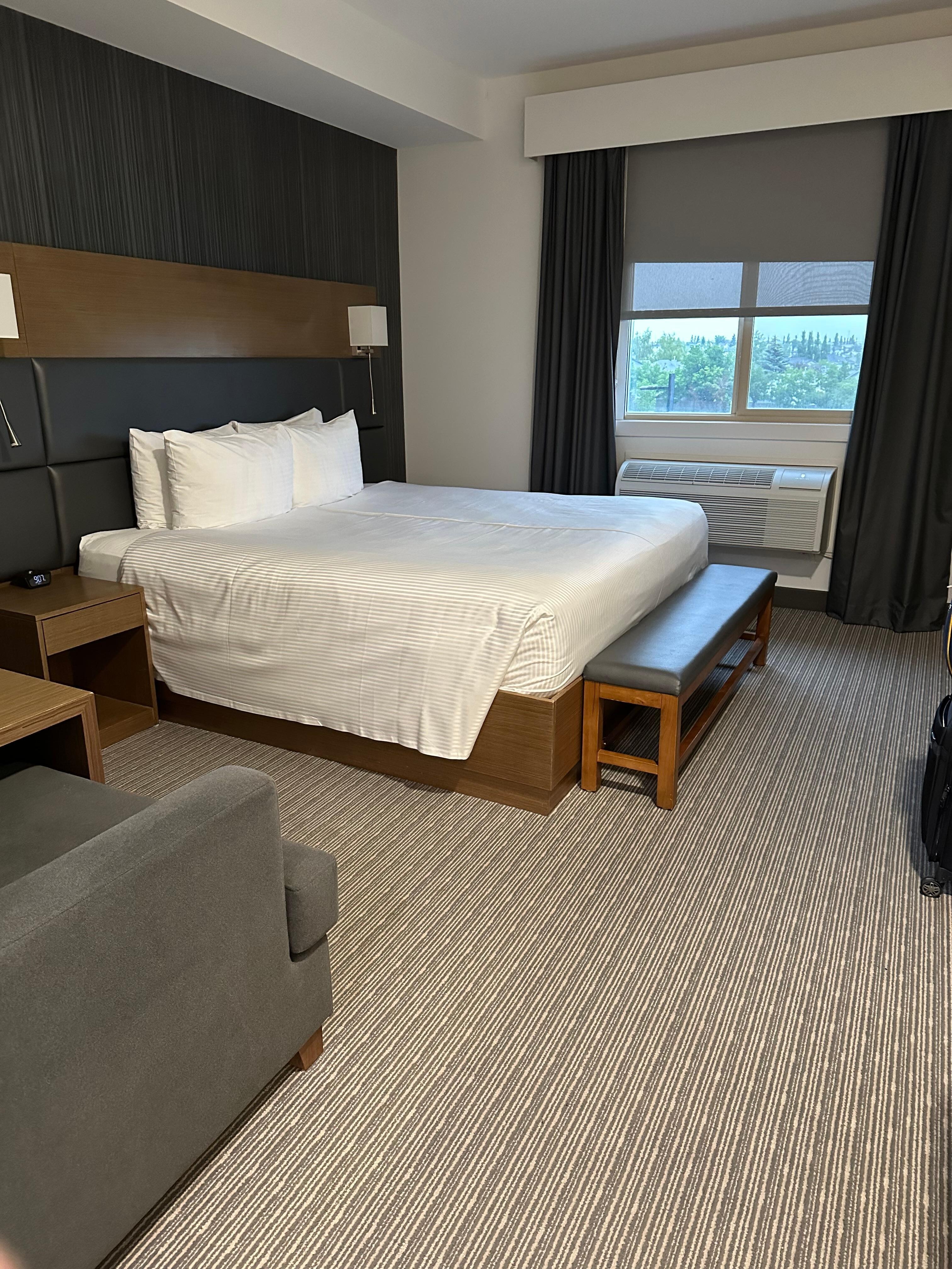 King bed.  Nice bedding. 