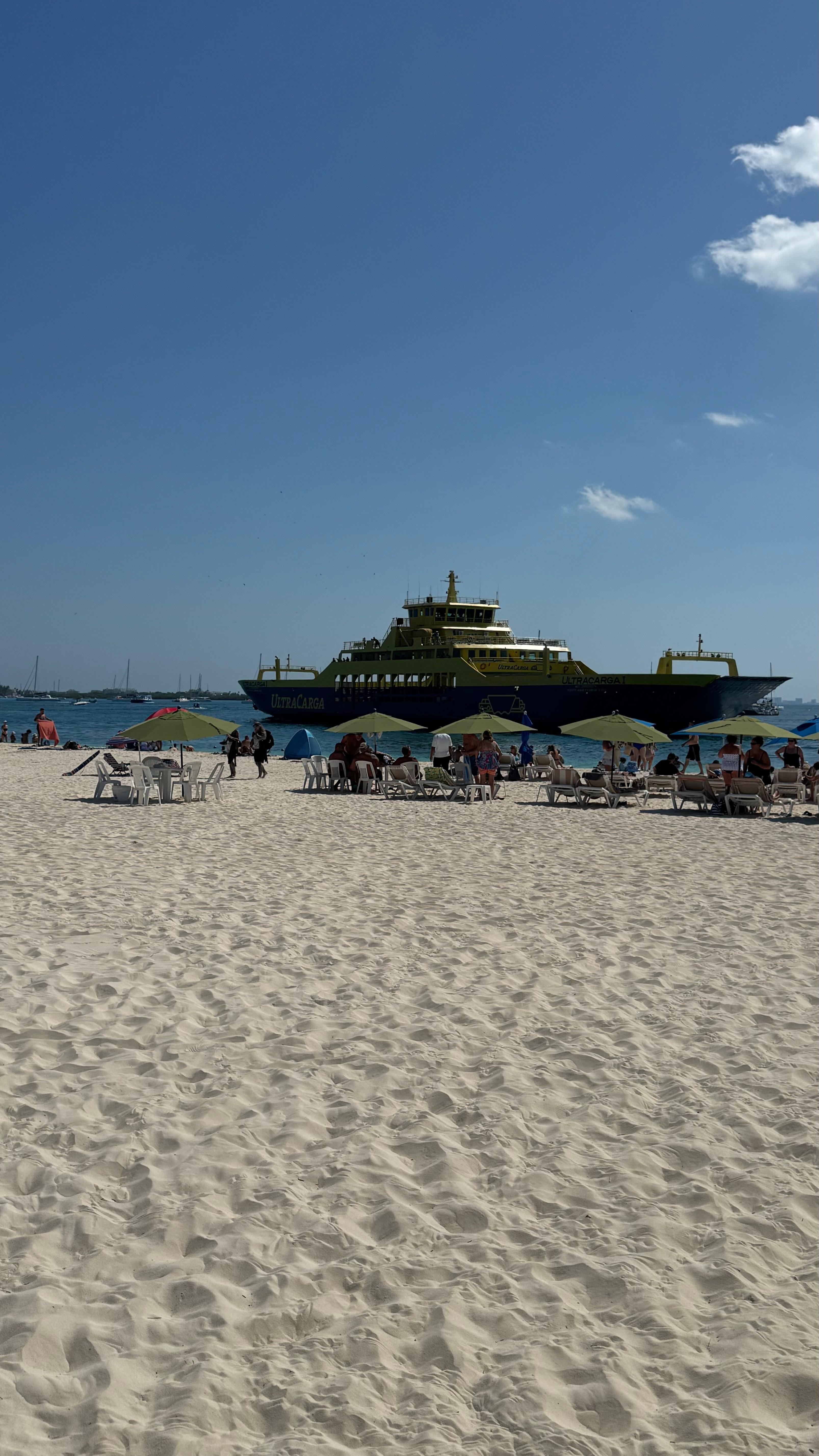 Beach with rental chairs and umbrellas 