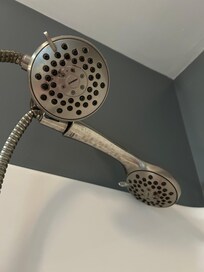 Shower head dirty.