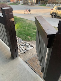 The gate leading off the patio.