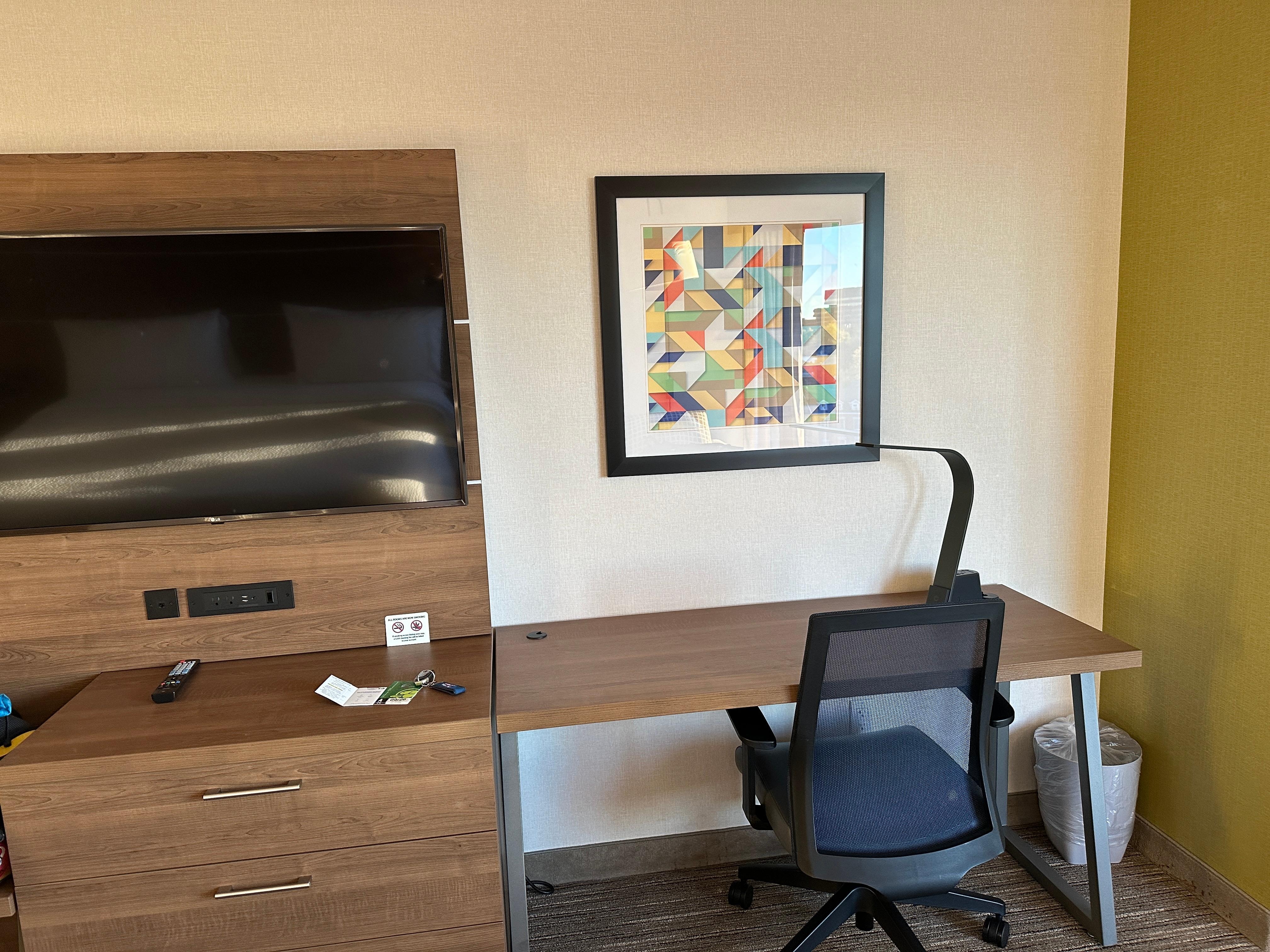 TV with HBO, lots of charging stations, desk