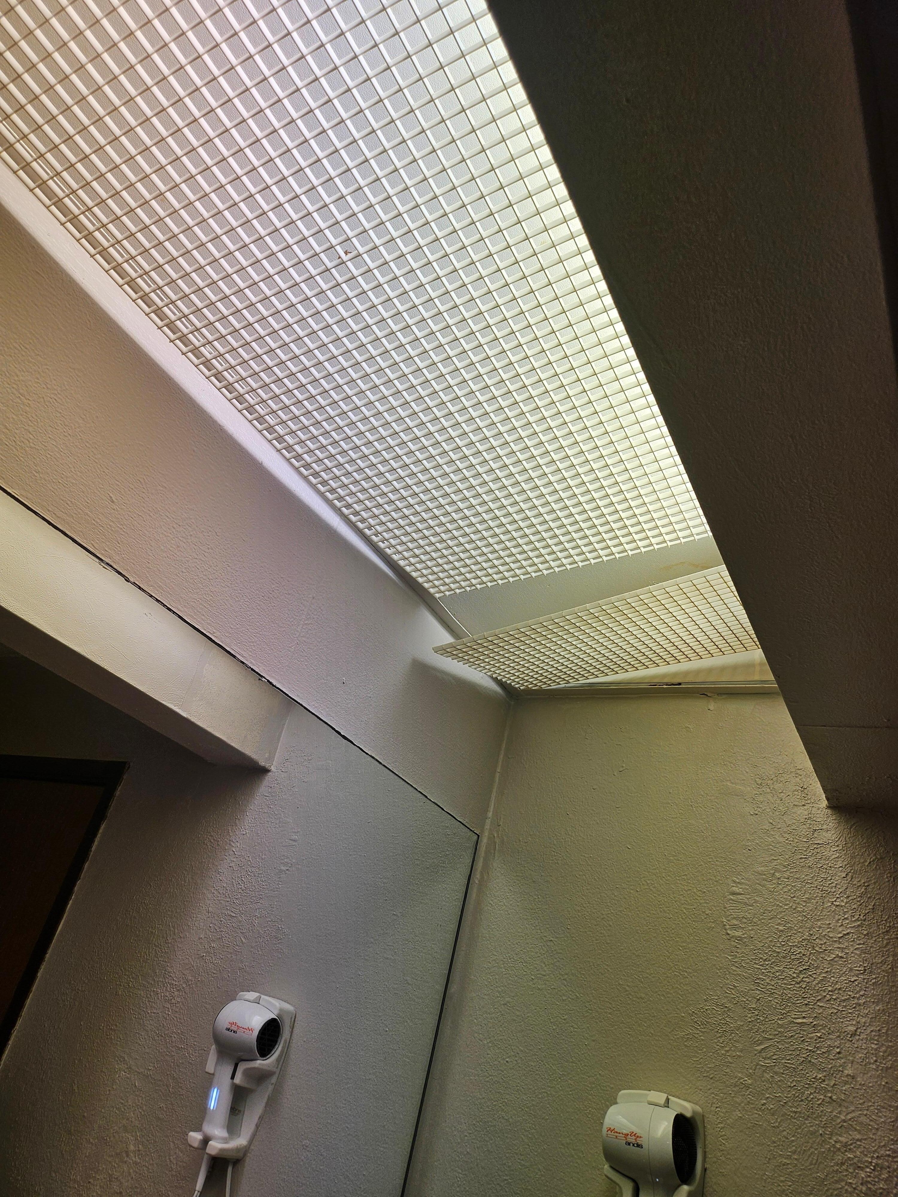 Light fixtures hanging loose in room when we arrived