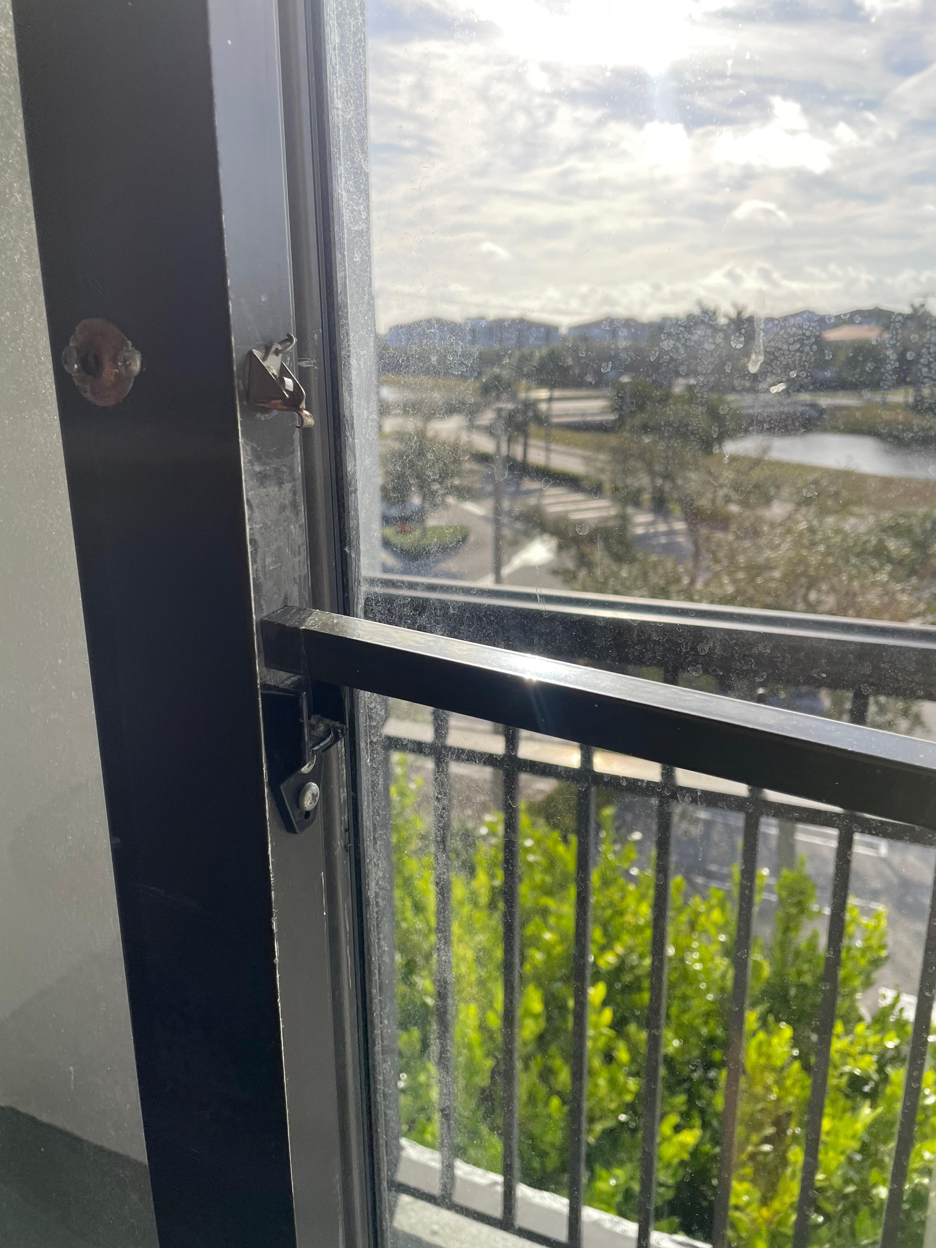 Makeshift door lock /bar to secure sliding door that wouldn’t close or seal properly resulting in excessive noise in room all night