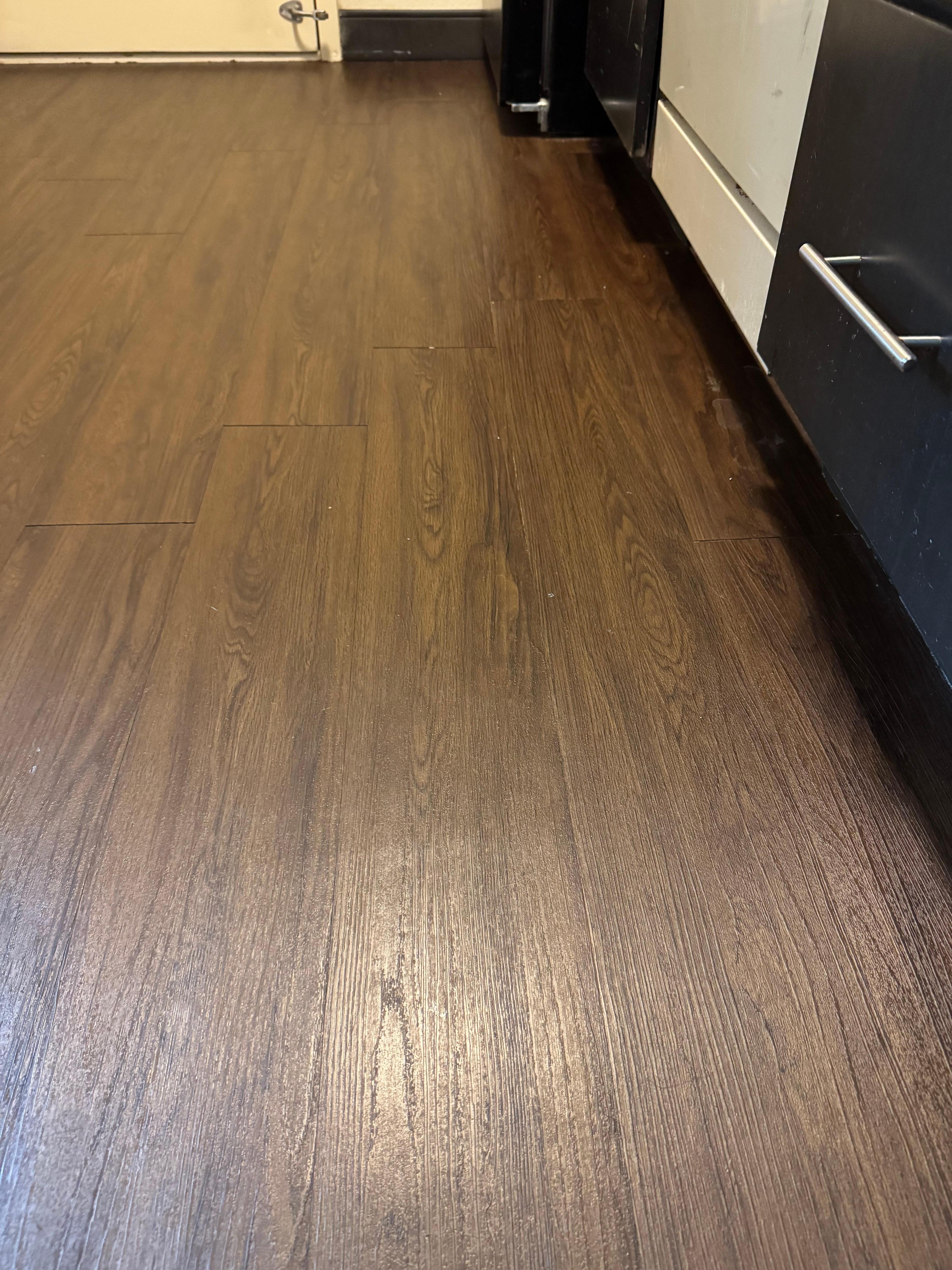 Dirt and debris on the floor, doesn't look like they even swept