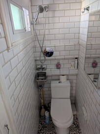 This is what they consider you the 2nd full bathroom but it's really an emergency shower stall toilet room