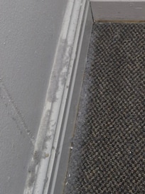Filthy dust next to the bed