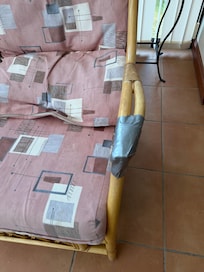 Gaffer tape on other arm rest