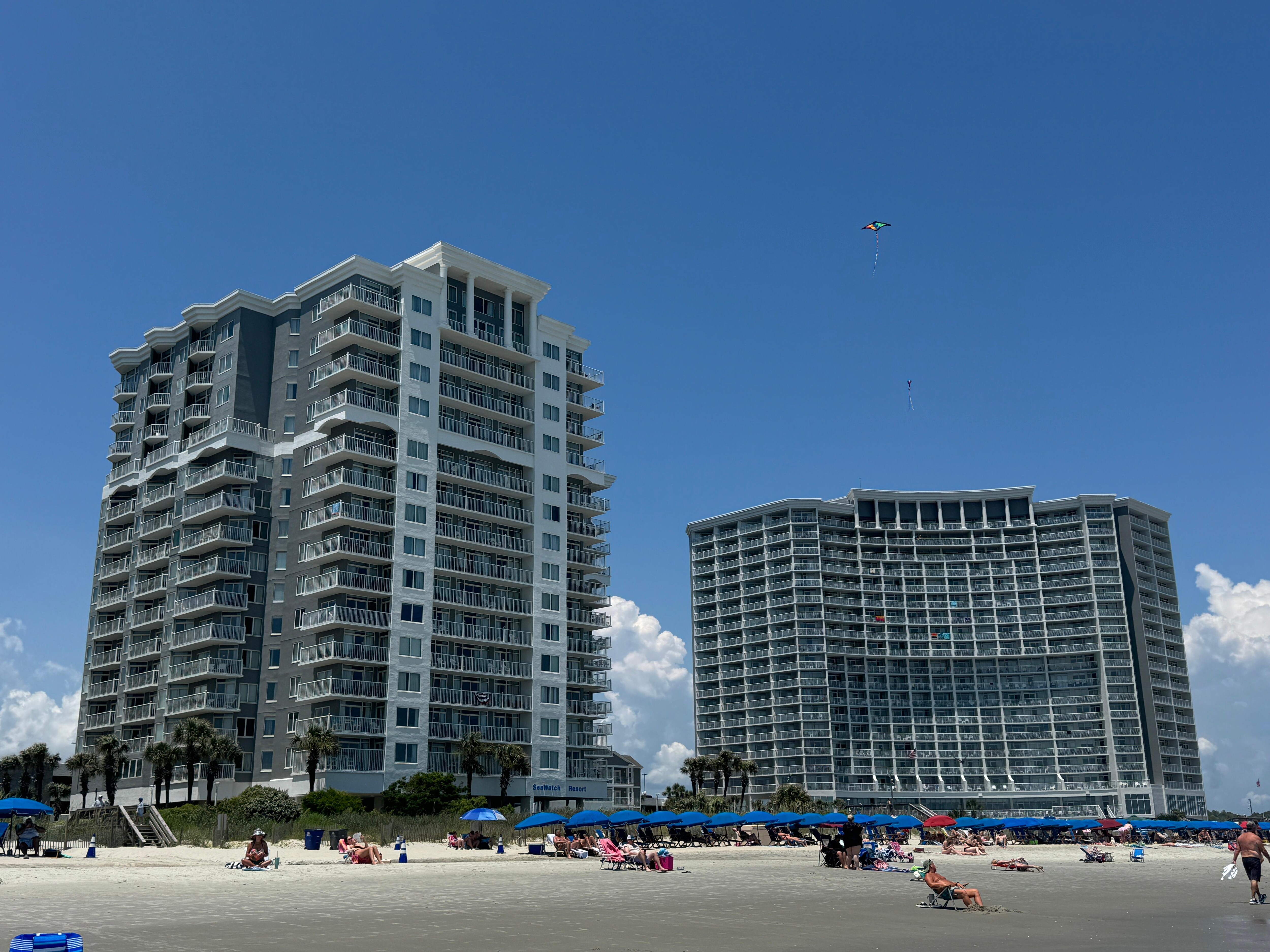 Both resort towers from beach view
