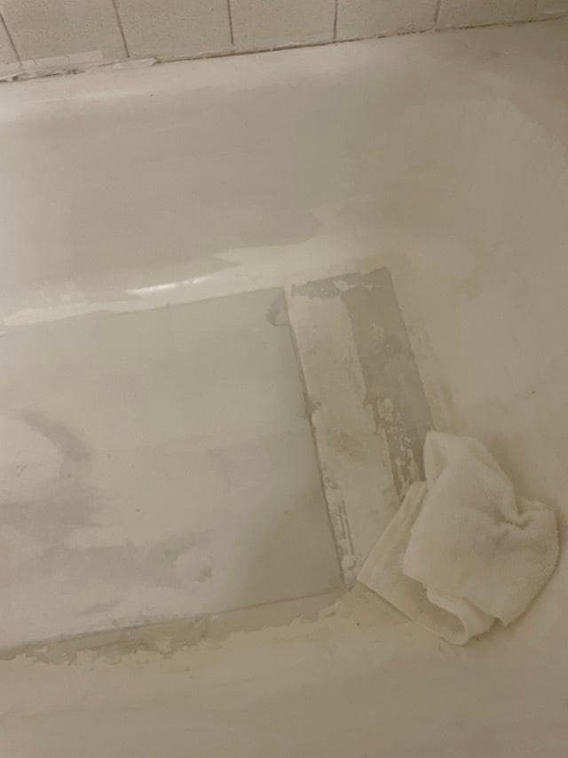 Filthy Mat in dirty Bath tub