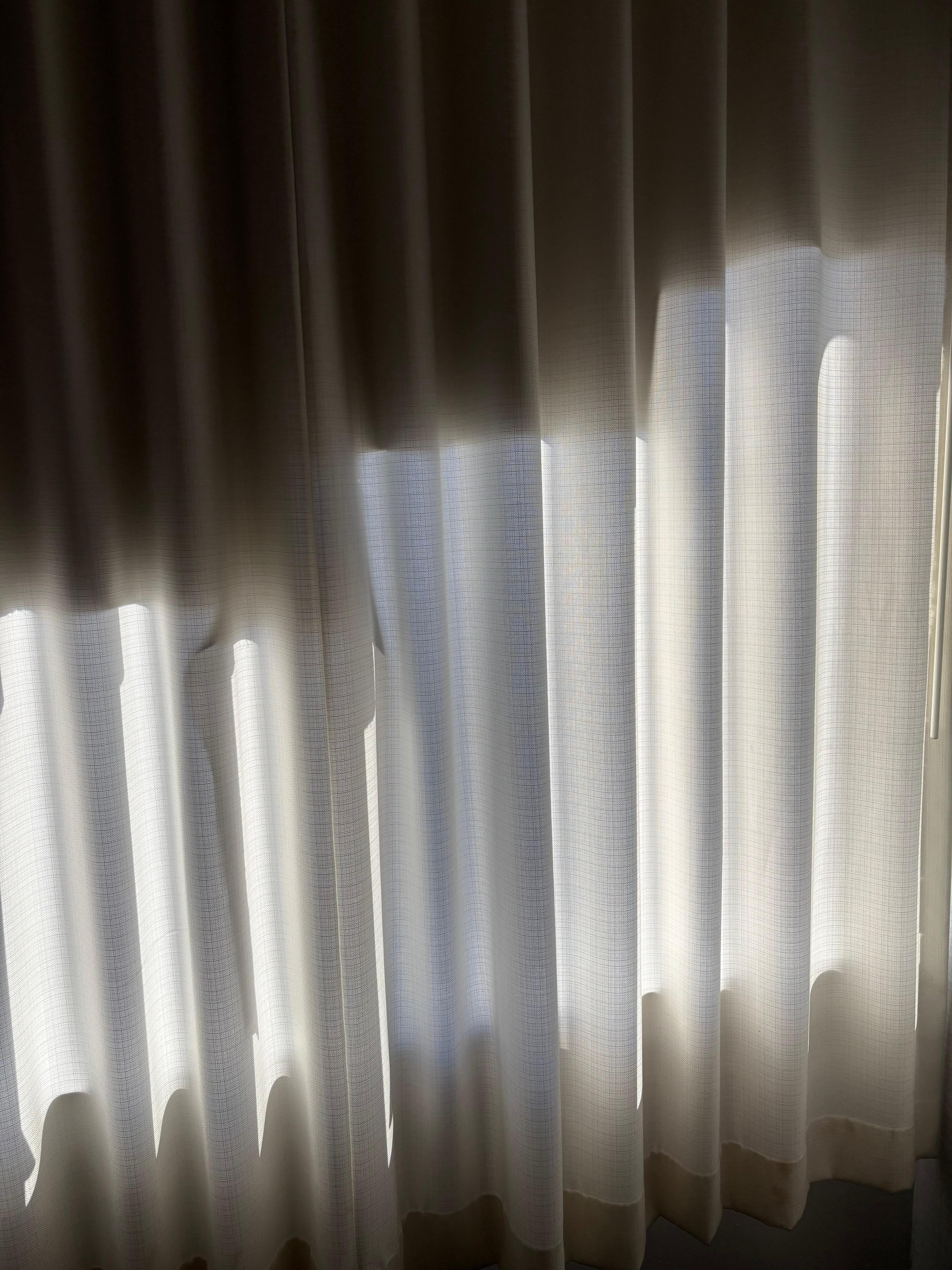 Torn blackout curtain