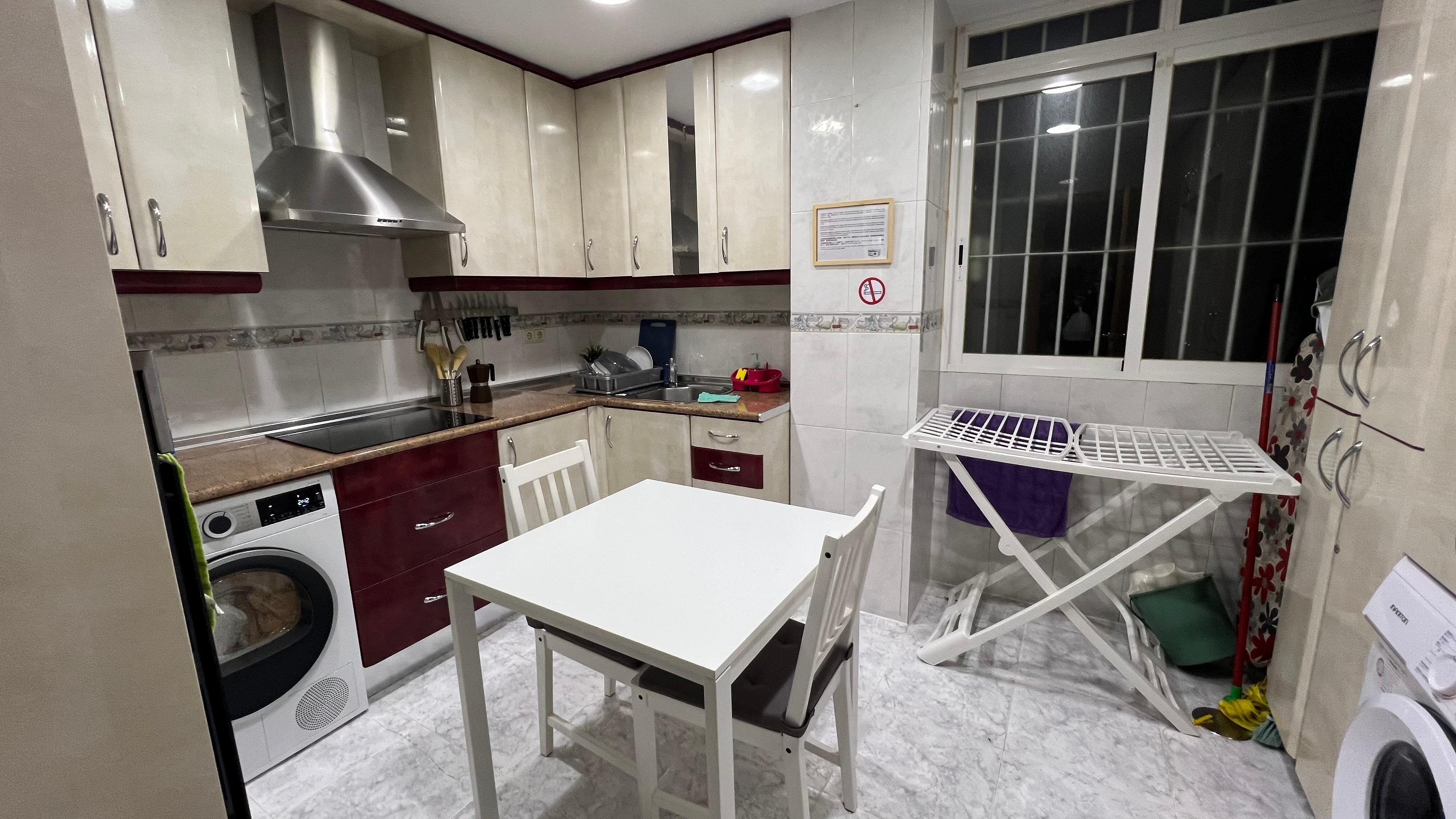 Small but very clean kitchen, has pots, pans, utensils, refrigerator, microwave, hot water kettle, everything you need