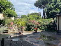 Backyard terrace and garden May 2025