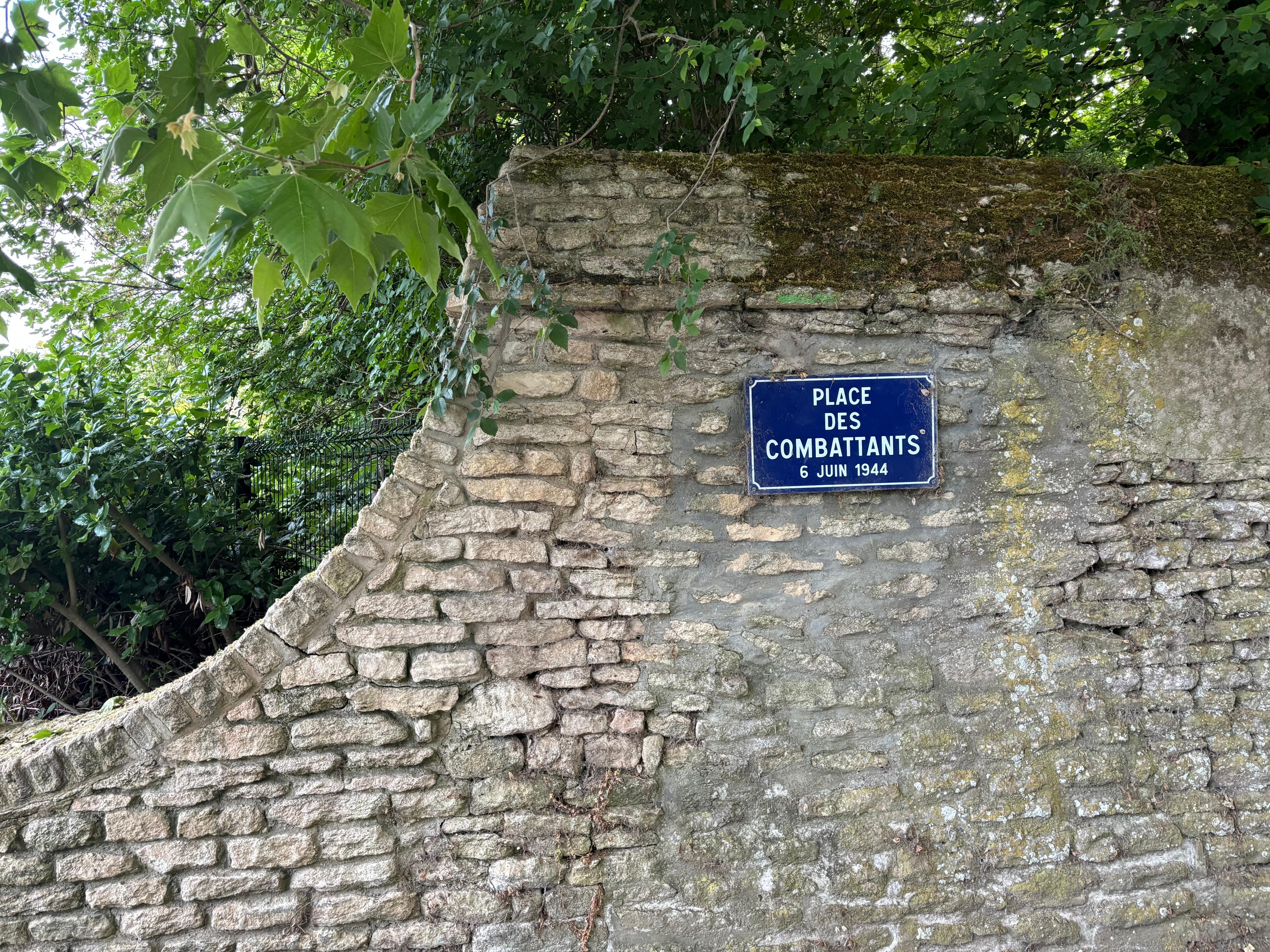 Quaint plaque near cemetery entrance 