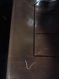 Trim stapple found by my leg when getting into bed. It was under the sheet inbedded in the plush part of the mattress.